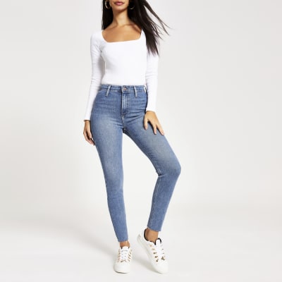 Kaia - Blauwe afgesneden disco jeans met hoge taille