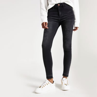 Molly - Zwarte wash distressed jeggings