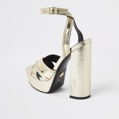 Gold metallic cross strap platform heels