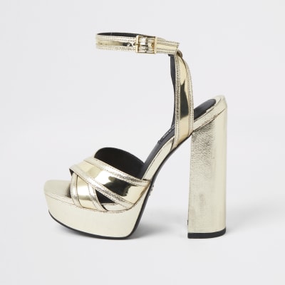 Gold metallic cross strap platform heels