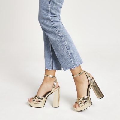 Gold metallic cross strap platform heels