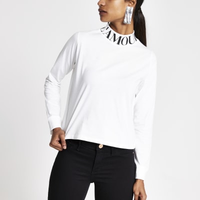 Witte hoogsluitende top met print en lange mouwen