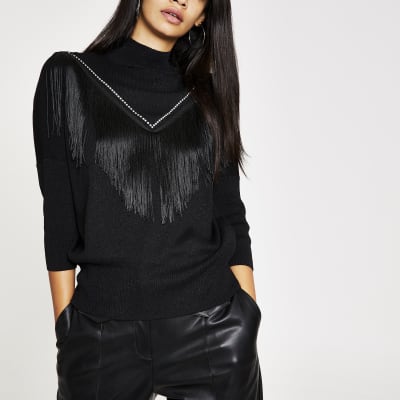 Zwarte gebreide pullover met franje en kwastjes