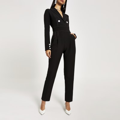 Zwarte jumpsuit met contrasterend stiksel en hoge taille