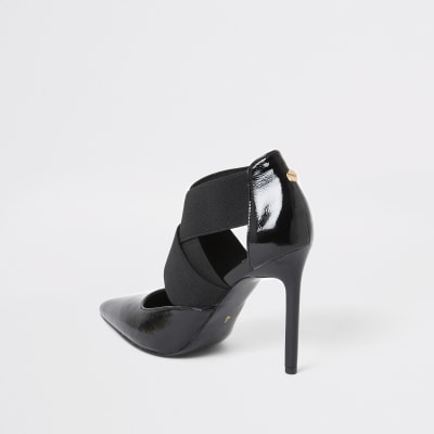 Black elastic strap court shoe