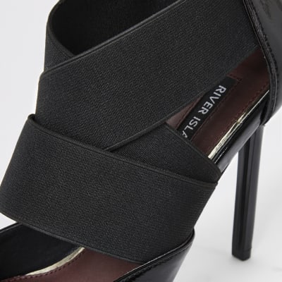 Black elastic strap court shoe