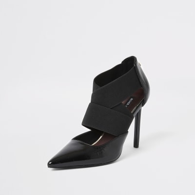 Black elastic strap court shoe
