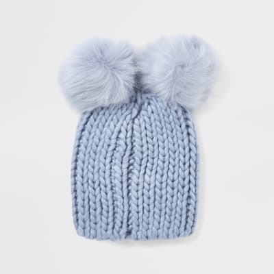 Blue faux fur pom pom beanie hat