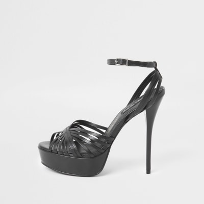 Zwarte sandalen van leer met plateauzool en smalle hak