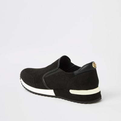 Schwarze, perforierte Laufschuhe