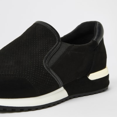 Schwarze, perforierte Laufschuhe