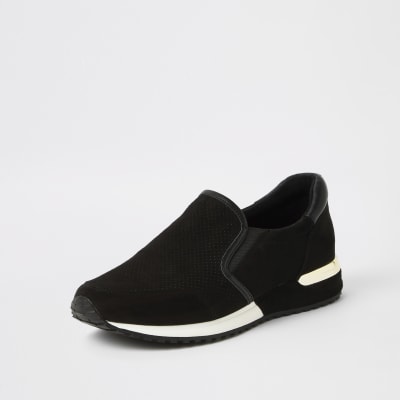 Schwarze, perforierte Laufschuhe