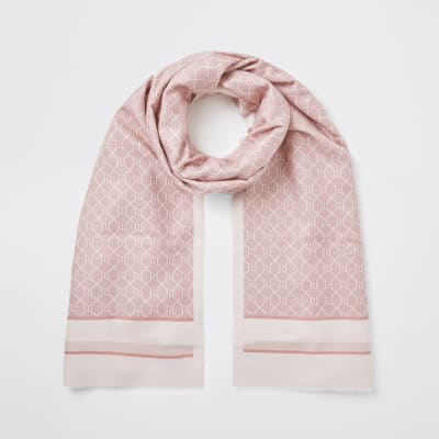 Pinkfarbener Schal in Blockfarben mit RI-Monogramm