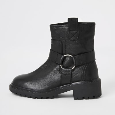 Bottes style motard en cuir noir avec harnais