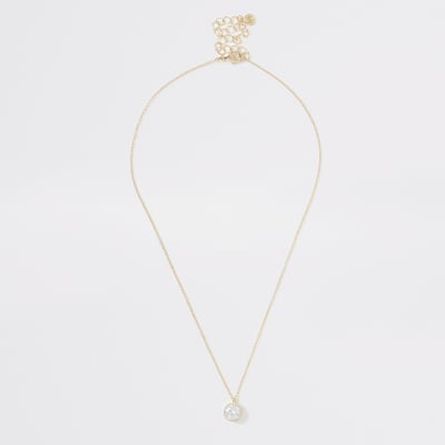 Goudkleurige ketting met studs en diamantjes