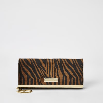 Brown tiger printed baguette clutch bag