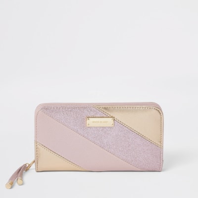 Roze portemonnee met rits rondom en glitter streep