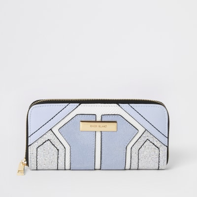 Porte-monnaie bleu zippé à empiècements brillants