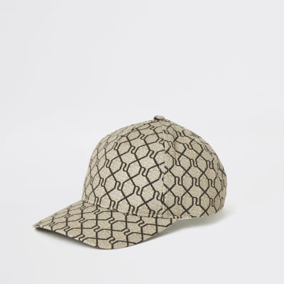 Bruine pet met RI-monogram