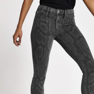 Petite schwarze Skinny Molly-Jeggings mit Print