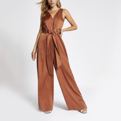 Donker oranje V-hals jumpsuit met ceintuur op de taille