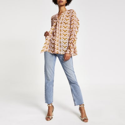 Roze blouse met print en strik aan de hals