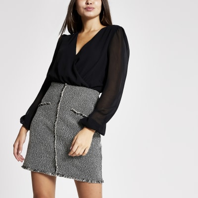 Zwarte 2-in-1 bouclé jurk met lange mouwen