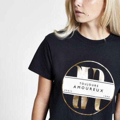 RI Petite - Zwart T-shirt met 'Toujours'-folieprint