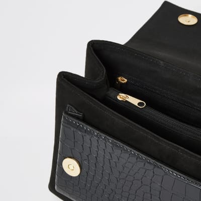 Black flap front underarm cross body bag