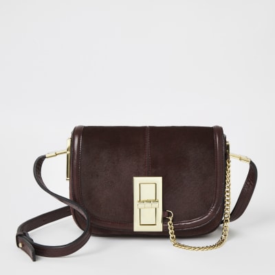 Paarse leren crossbodytas met slotje voorop