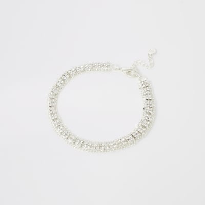 Zilverkleurige enkelbandje met stras