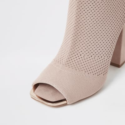 Pinke Sock-Stiefel mit Lochstrickmuster und weiter Passform