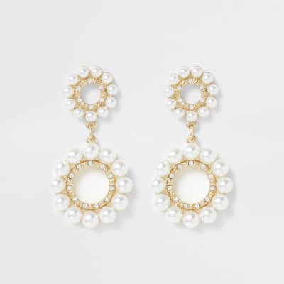 Goudkleurige ring oorhangers met parel