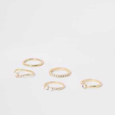 Set van 5 goudkleurige ringen verfraaid met parels en siersteentjes