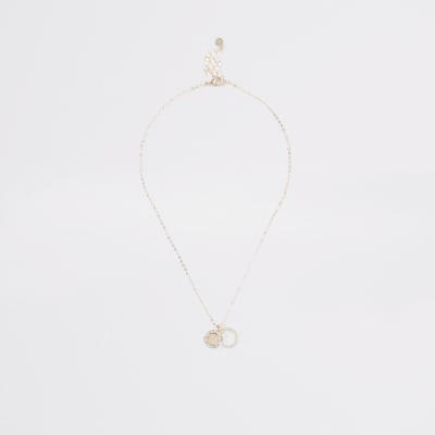 Roségoudkleurige ring ketting met siersteentjes