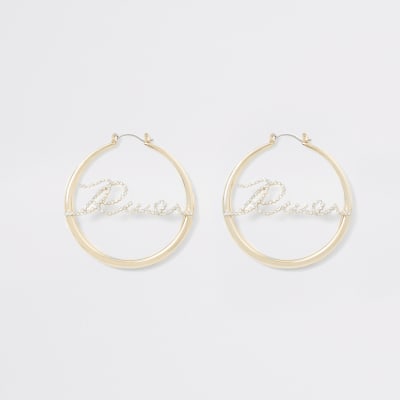 Goudkleurige River oorringen met siersteentjes