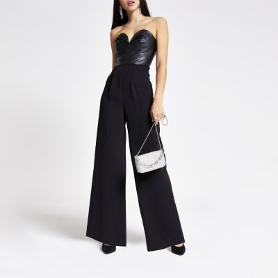 Zwarte bardotjumpsuit met inzetstuk van imitatieleer