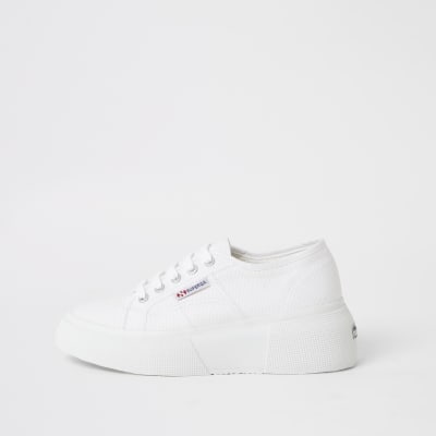 white canvas lace up flatform trainers