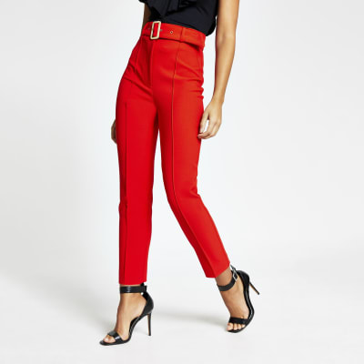 Red belted high rise peg trousers