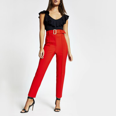 Red belted high rise peg trousers