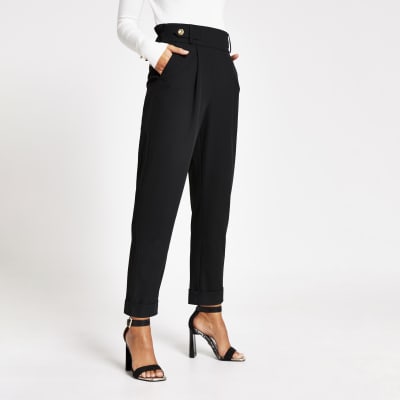 Black button waist peg trousers