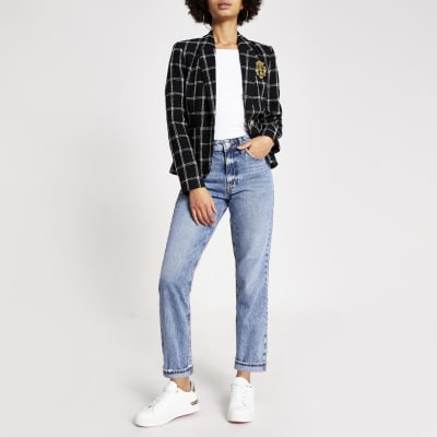 Blazer en maille bouclée noir à carreaux  orné d'une broche