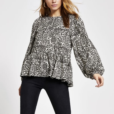 Beige gesmokte top met dierenprint en lange mouwen