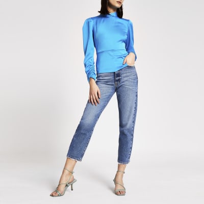 Bright blue high twisted neck blouse