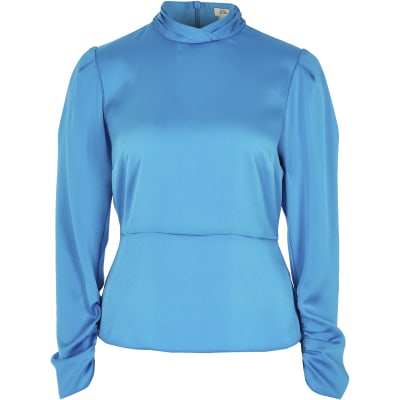 Bright blue high twisted neck blouse