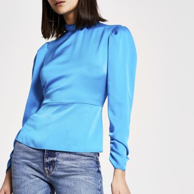 Bright blue high twisted neck blouse