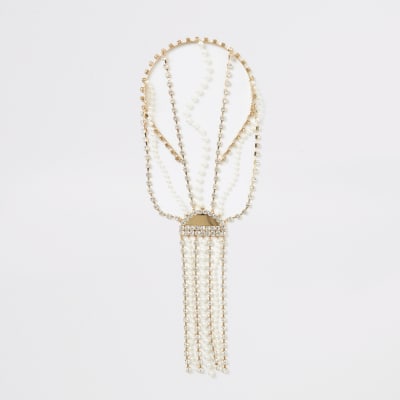 Gold embellished tassel back headband
