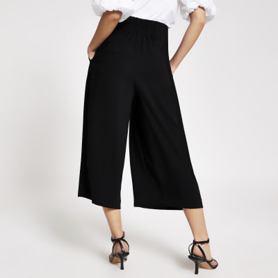 Black button front cropped wide leg trousers