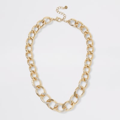 Gouden stevige ketting met siersteentjes