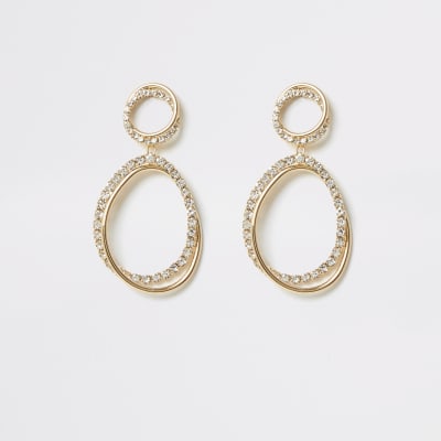 Boucles d'oreilles entrelacées dorées à strass
